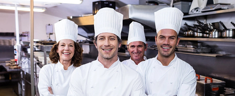 chefs cooking in kitchen